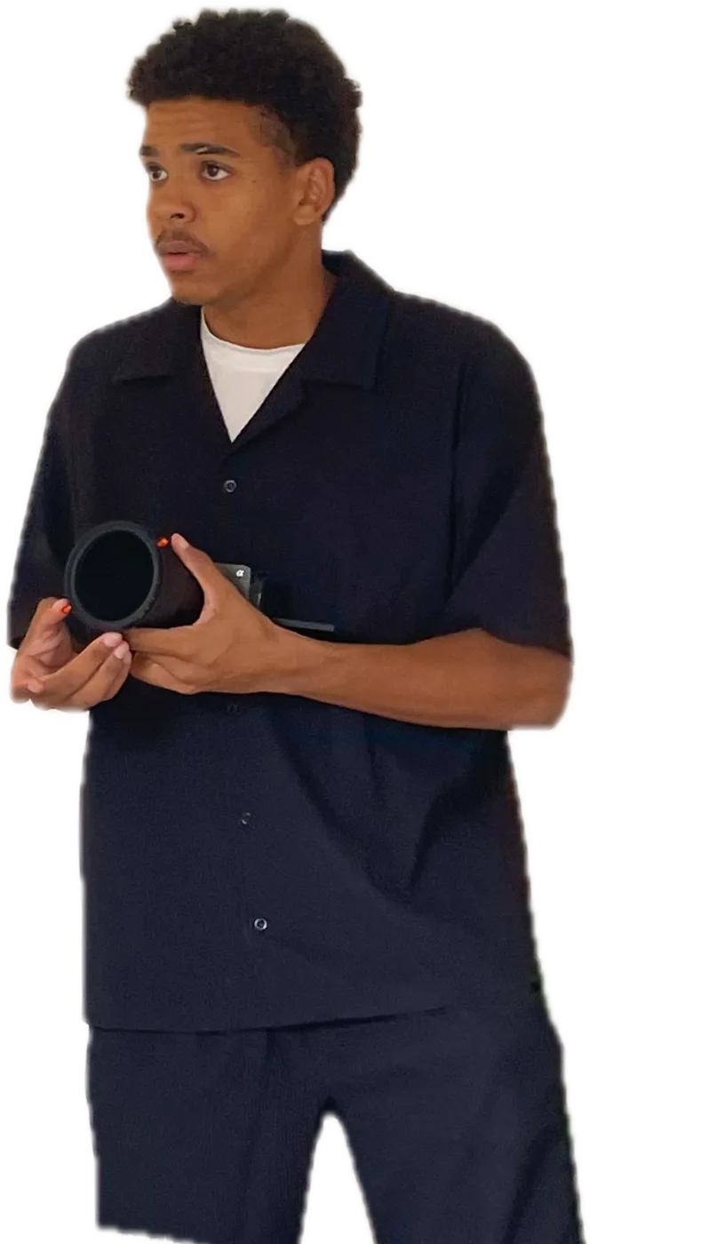 Fabrice, appareil photo en main